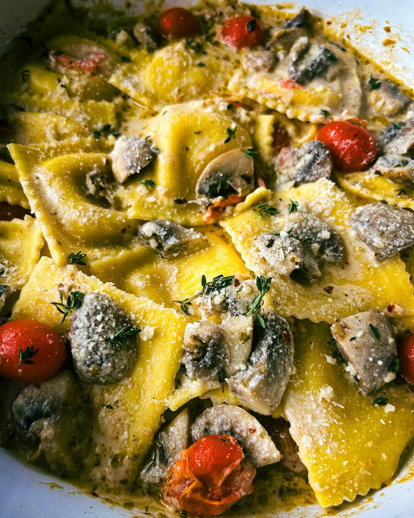 Creamy Mushroom Tomato Ravioli with Parmesan Garlic Sauce