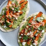 Smoky Paprika Sweet Potato Flatbreads with Guacamole, Feta, and Spicy Mayo